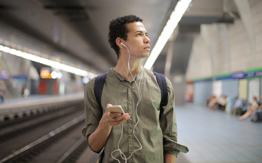 Man using phone on London underground needs to cut down on mobile data use