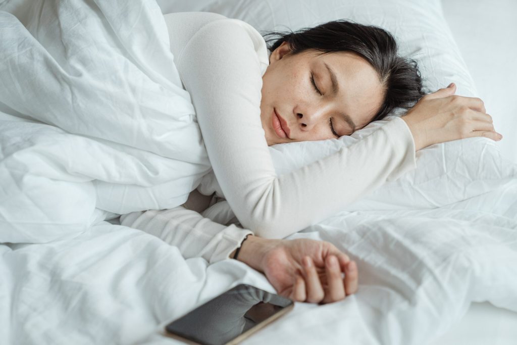 Woman uses iPhone sleep timer for better sleep