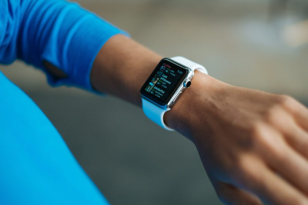 Woman uses Apple Smart Watch with extra SIM