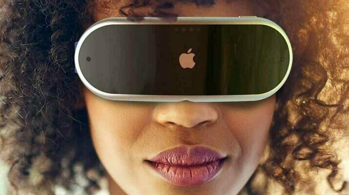 Woman wears Apple VR headset or AR goggles