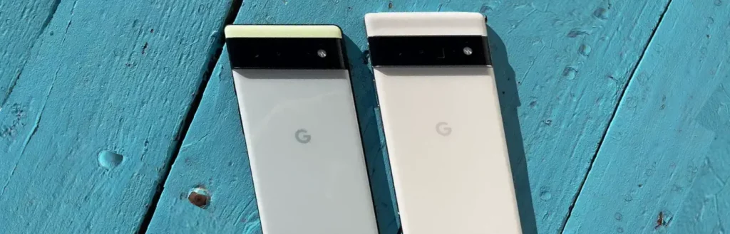 Two Google Pixel 6a models on blue background as the best budget phones for business