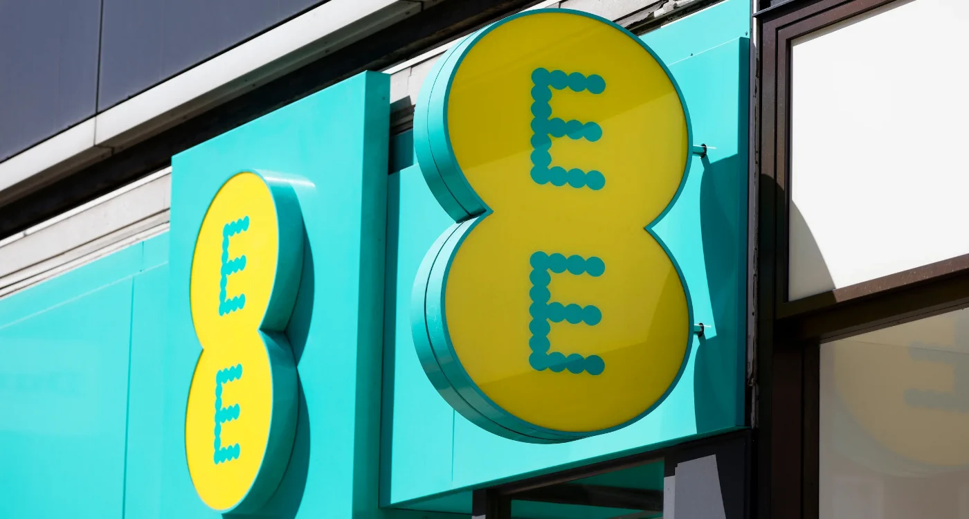 Real life photograph of EE network storefront sign in London
