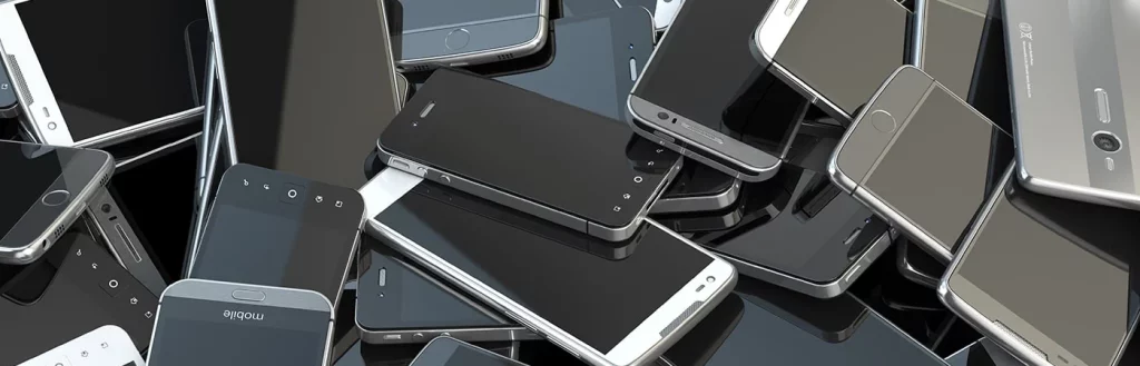 Pile of smartphone models with blank screens