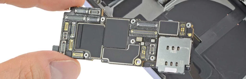 Person holds smartphone RAM hardware component inbetween their fingers