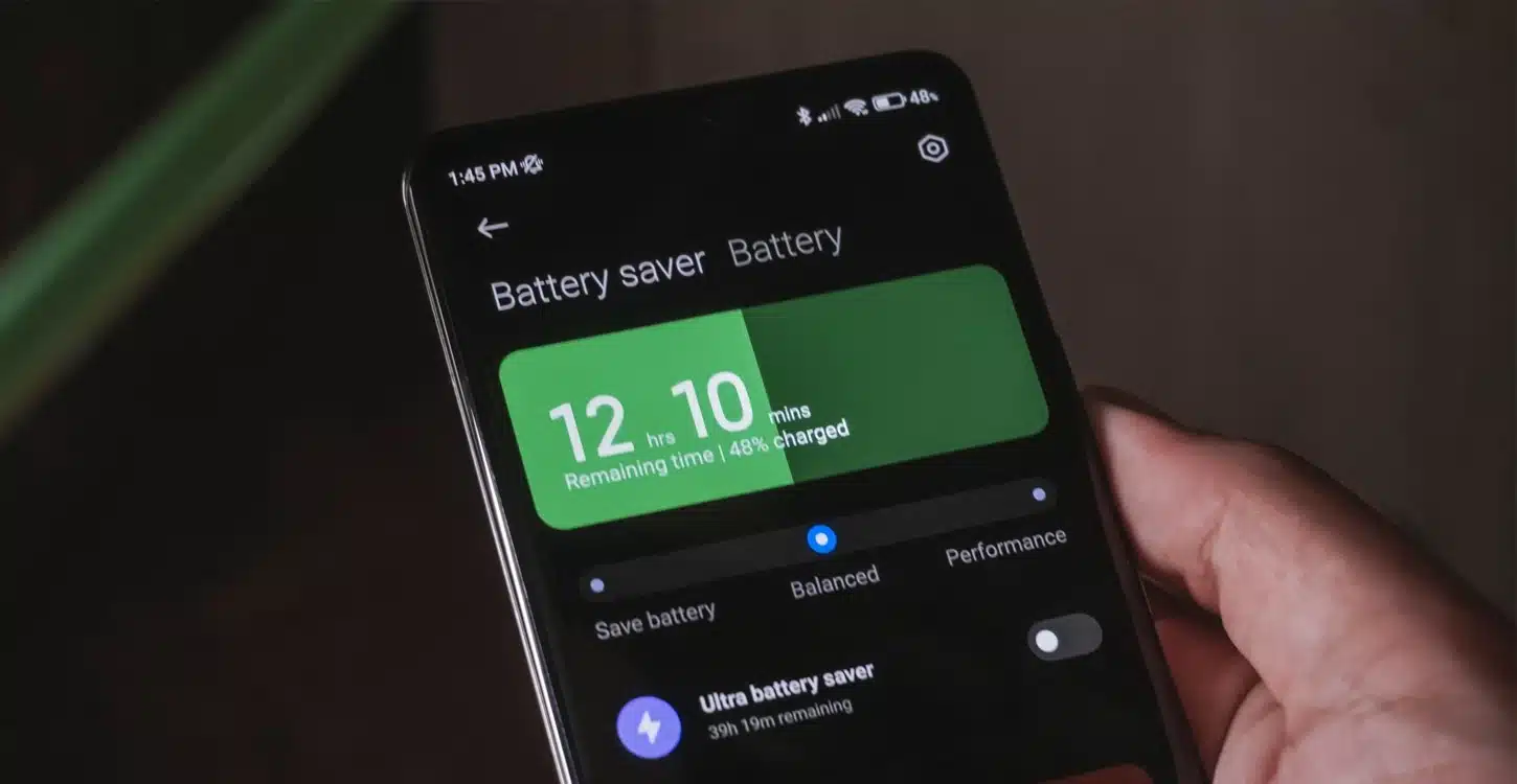 Best battery mobile phones of 2025 - smartphone in battery saver mode with 12 hours of life left