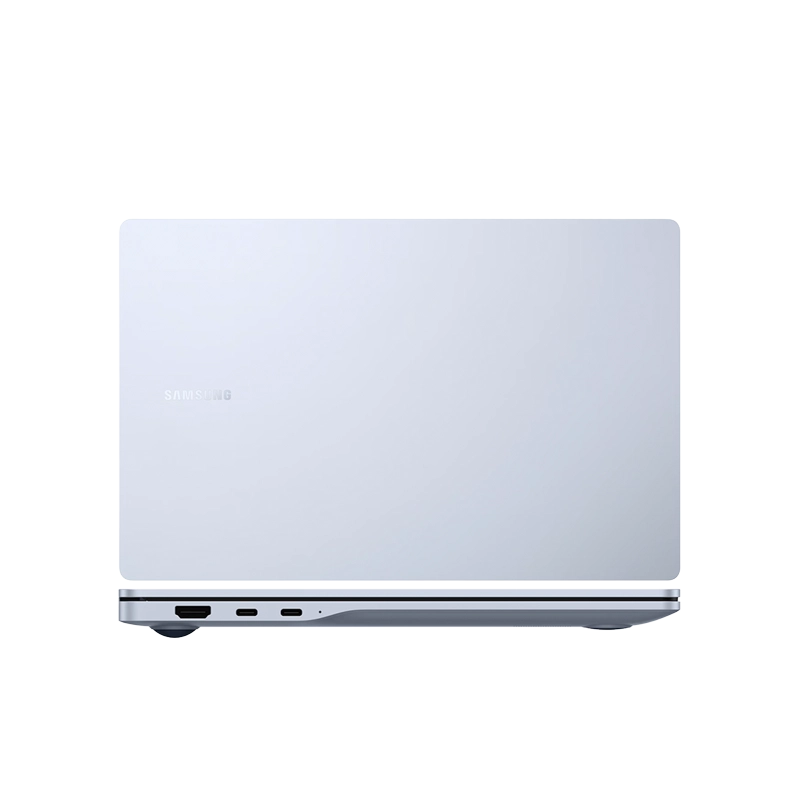 A view of the closed, light silver/blue Samsung Galaxy Book 5 Edge 5G laptop from the back, showing the Samsung logo on the lid. The bottom edge reveals an HDMI port and two USB-C ports.